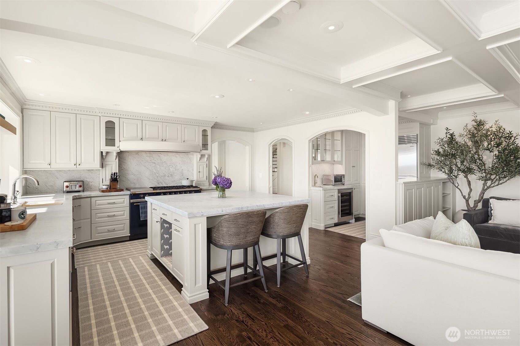 2307 Evergreen Point Road Medina, WA 98039 - Photo 18 of 40 a kitchen with a sink a counter top space and stainless steel appliances
