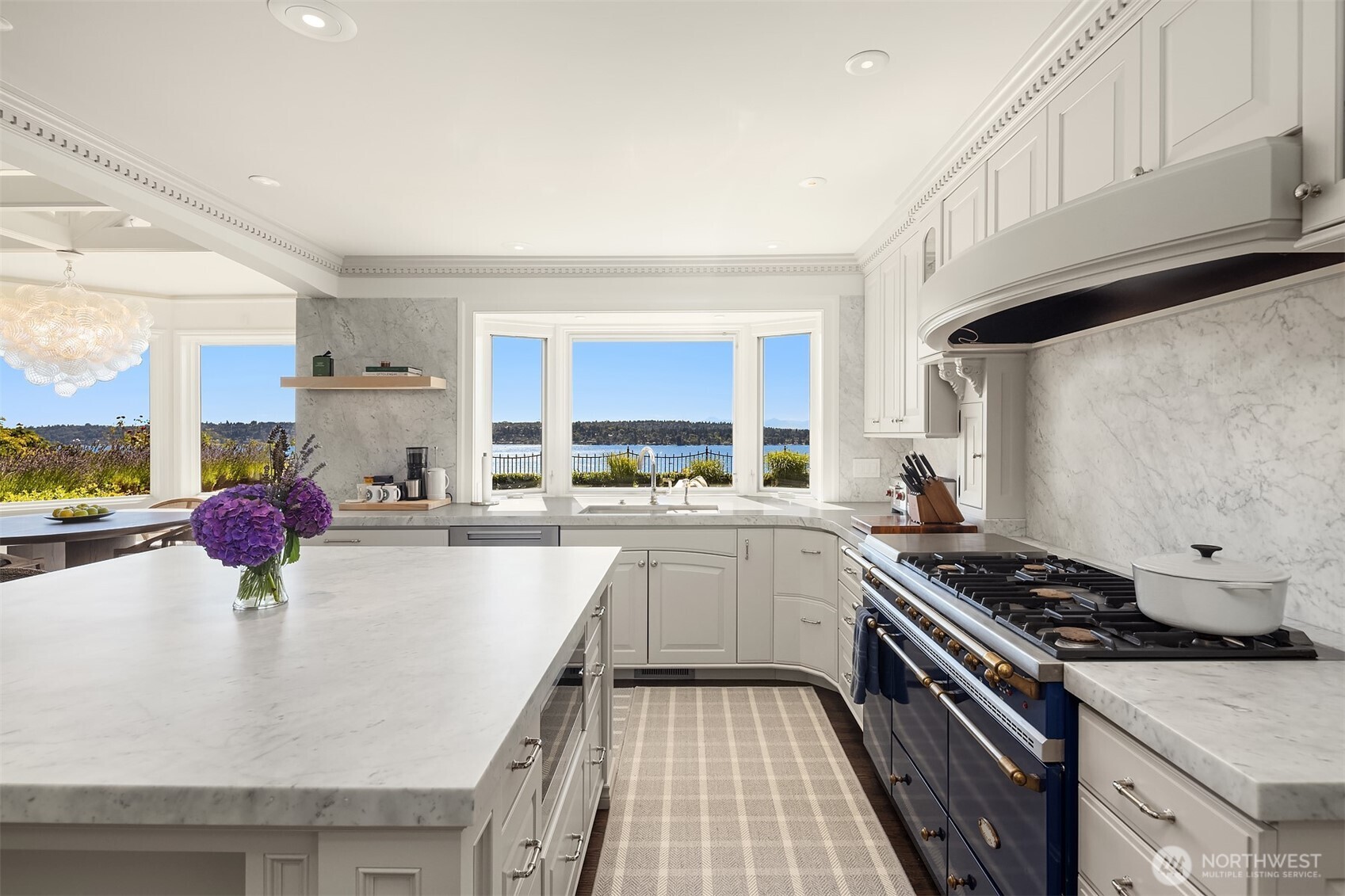 2307 Evergreen Point Road Medina, WA 98039 - Photo 19 of 40 a kitchen with a sink a stove and cabinets