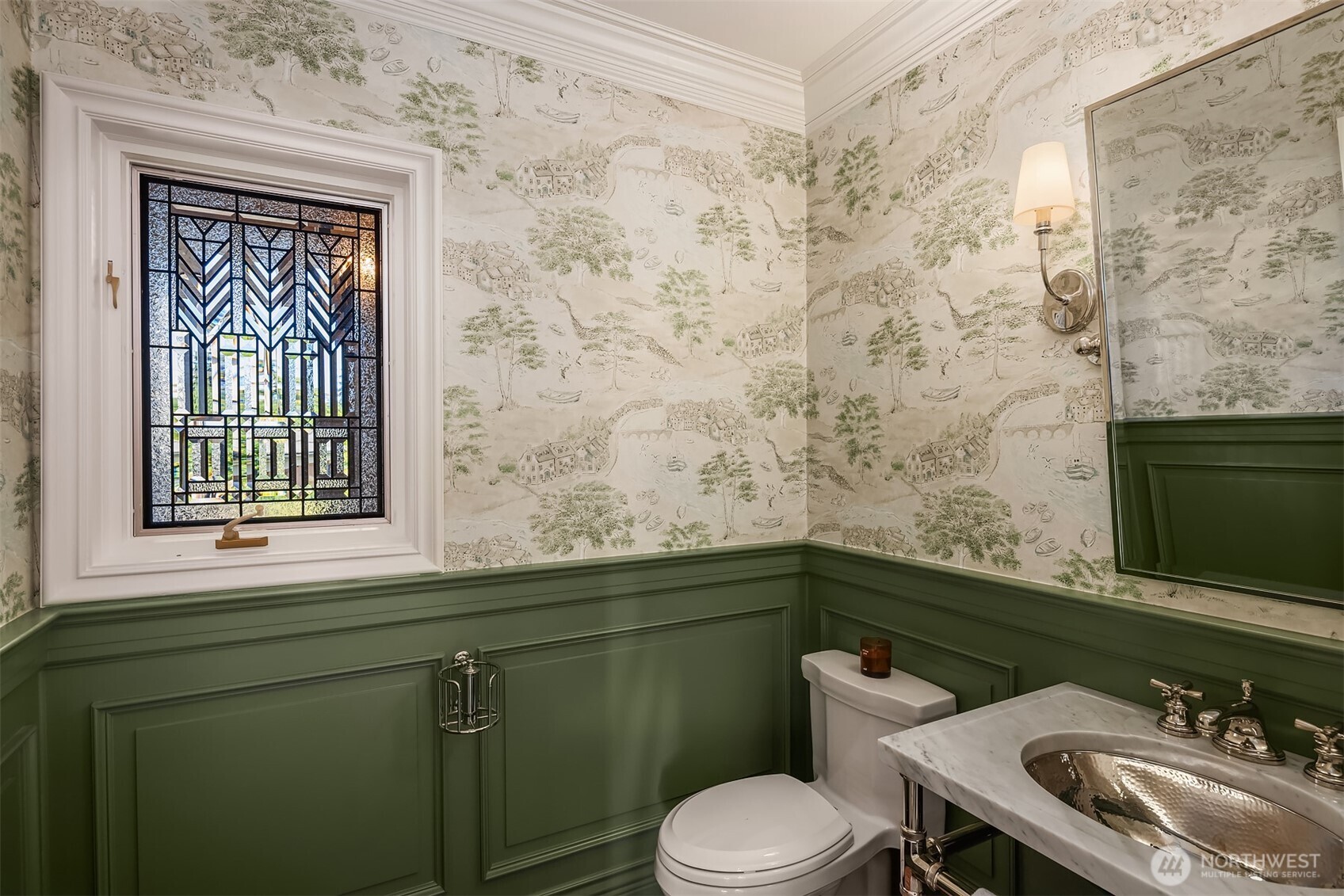 2307 Evergreen Point Road Medina, WA 98039 - Photo 21 of 40 a bathroom with a sink a toilet and a mirror
