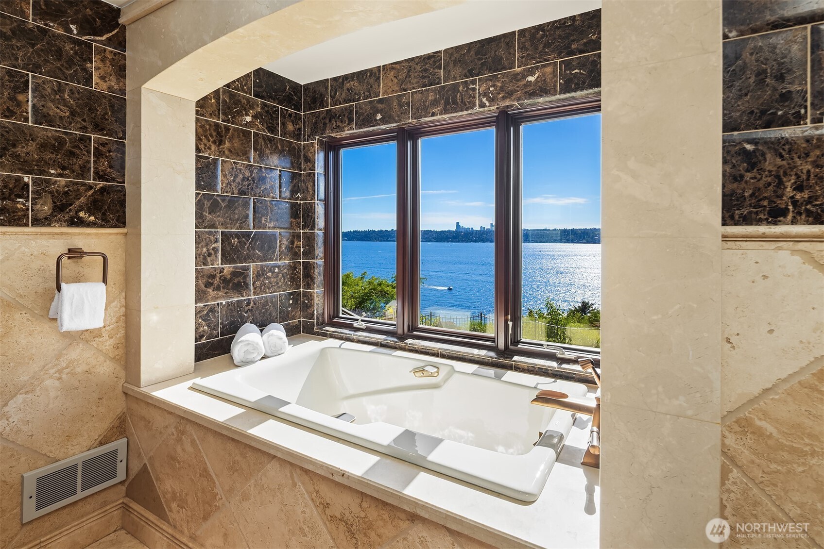 2307 Evergreen Point Road Medina, WA 98039 - Photo 27 of 40 a bathroom with a tub and a sink