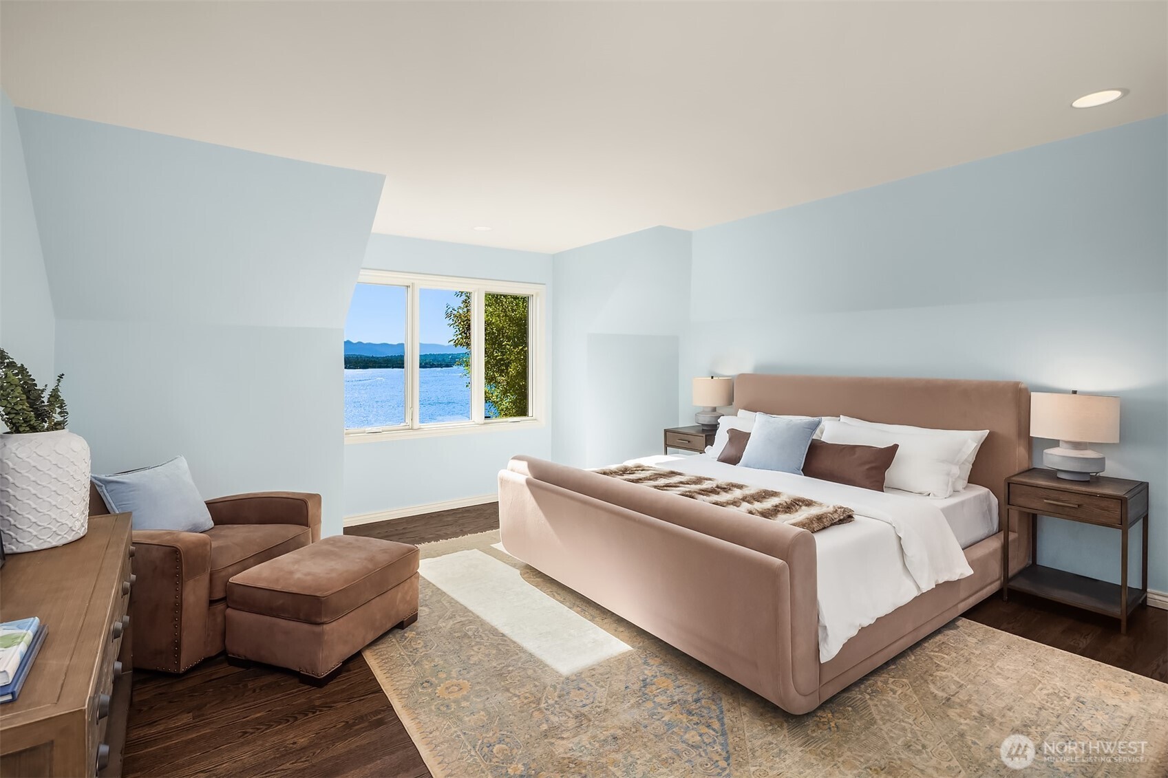 2307 Evergreen Point Road Medina, WA 98039 - Photo 31 of 40 a bedroom with a bed lamp and a couch