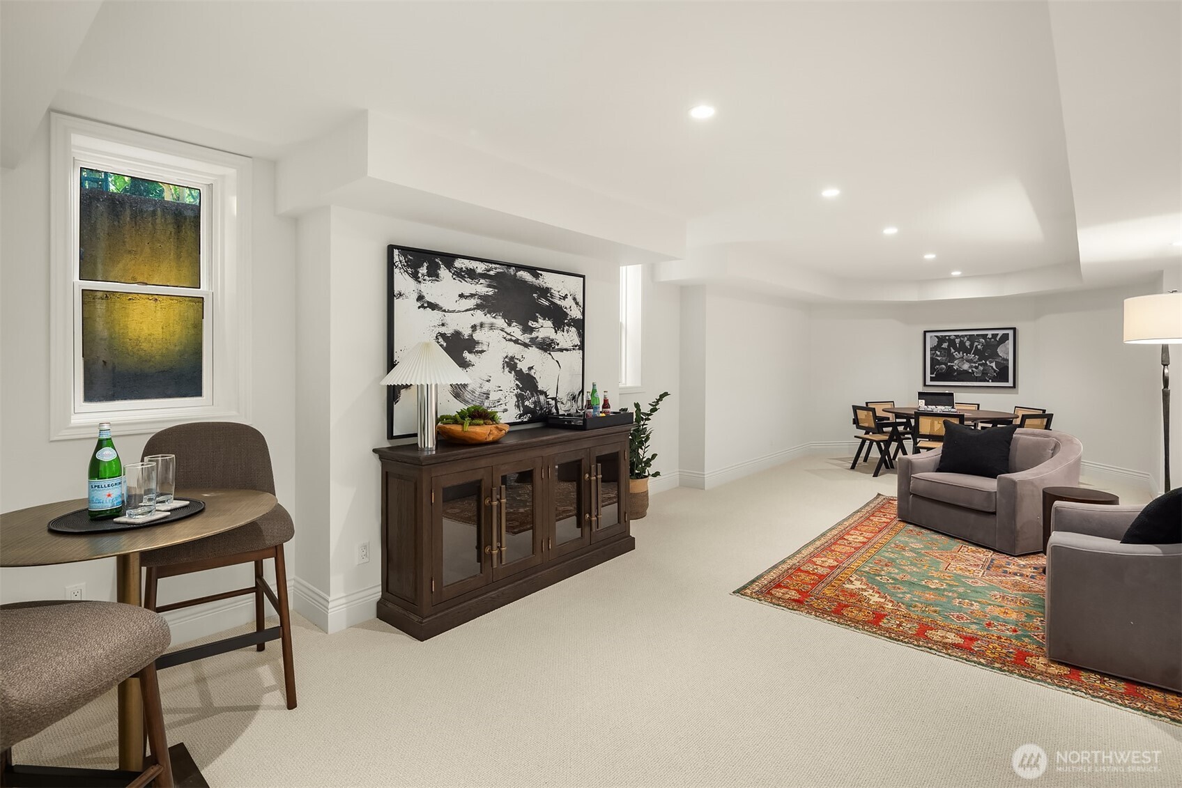 2307 Evergreen Point Road Medina, WA 98039 - Photo 36 of 40 a living room with furniture and a flat screen tv