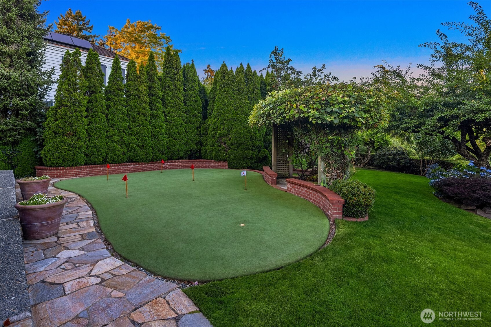 2307 Evergreen Point Road Medina, WA 98039 - Photo 40 of 40 a view of a swimming pool with a yard