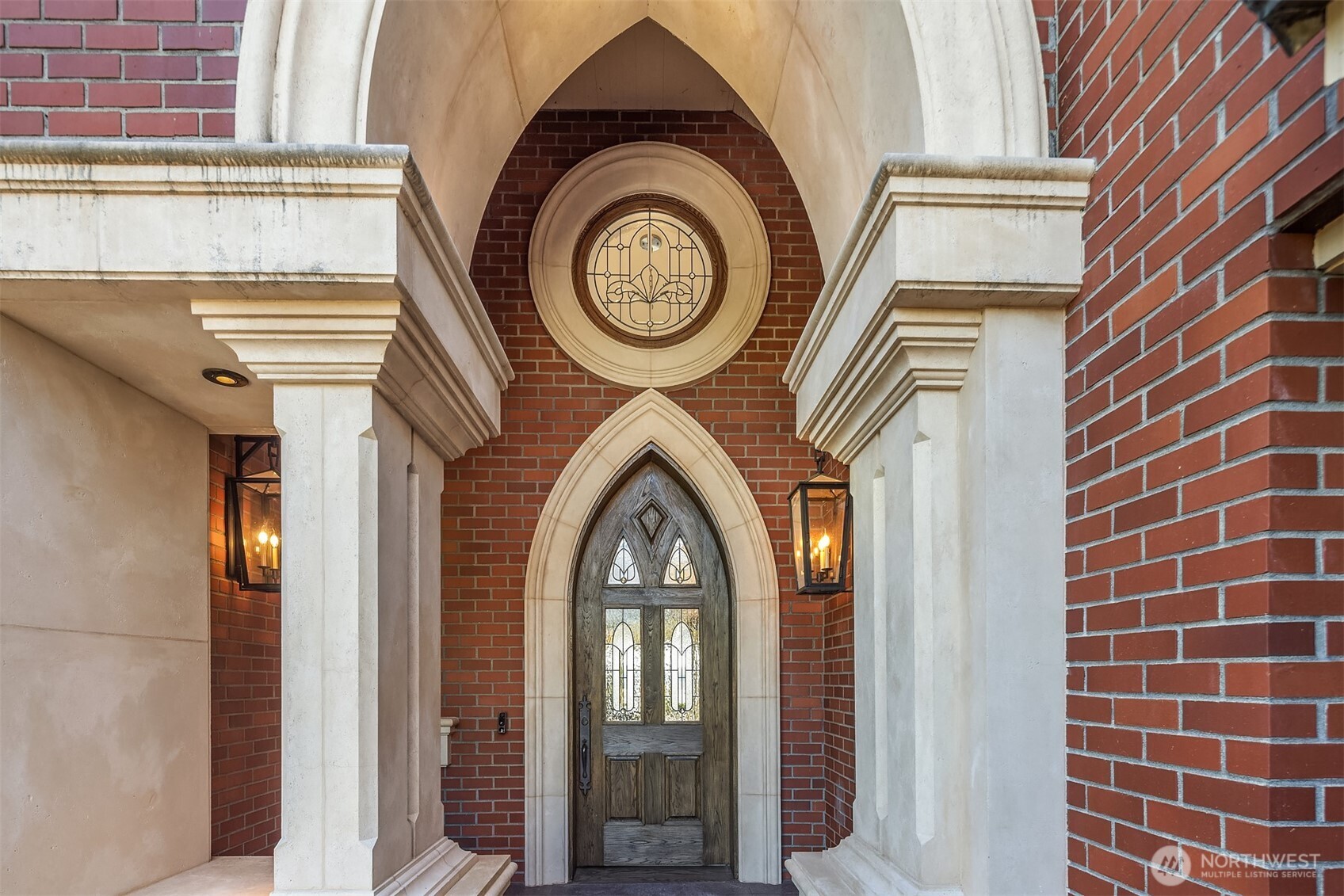 2307 Evergreen Point Road Medina, WA 98039 - Photo 5 of 40 a view of a door of a house with a large tree