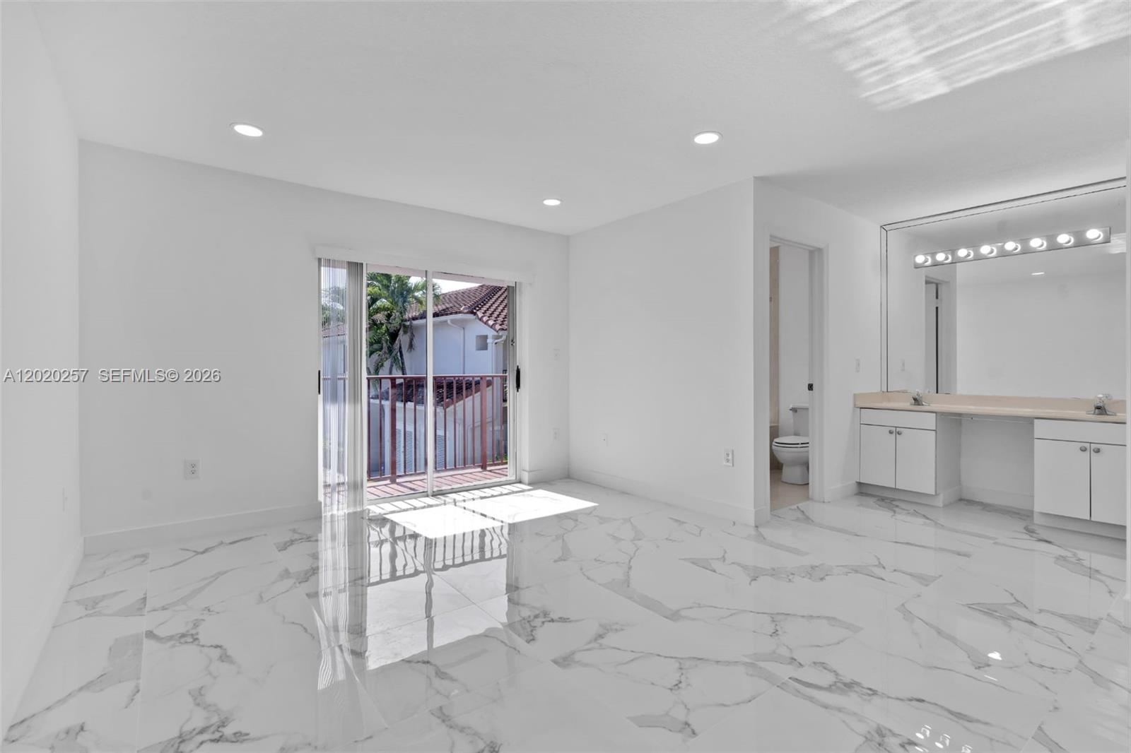 10245 Southwest 154th Place, Unit 1123 Miami, FL 33196 - Photo 4 of 38 a view of a hallway with chairs