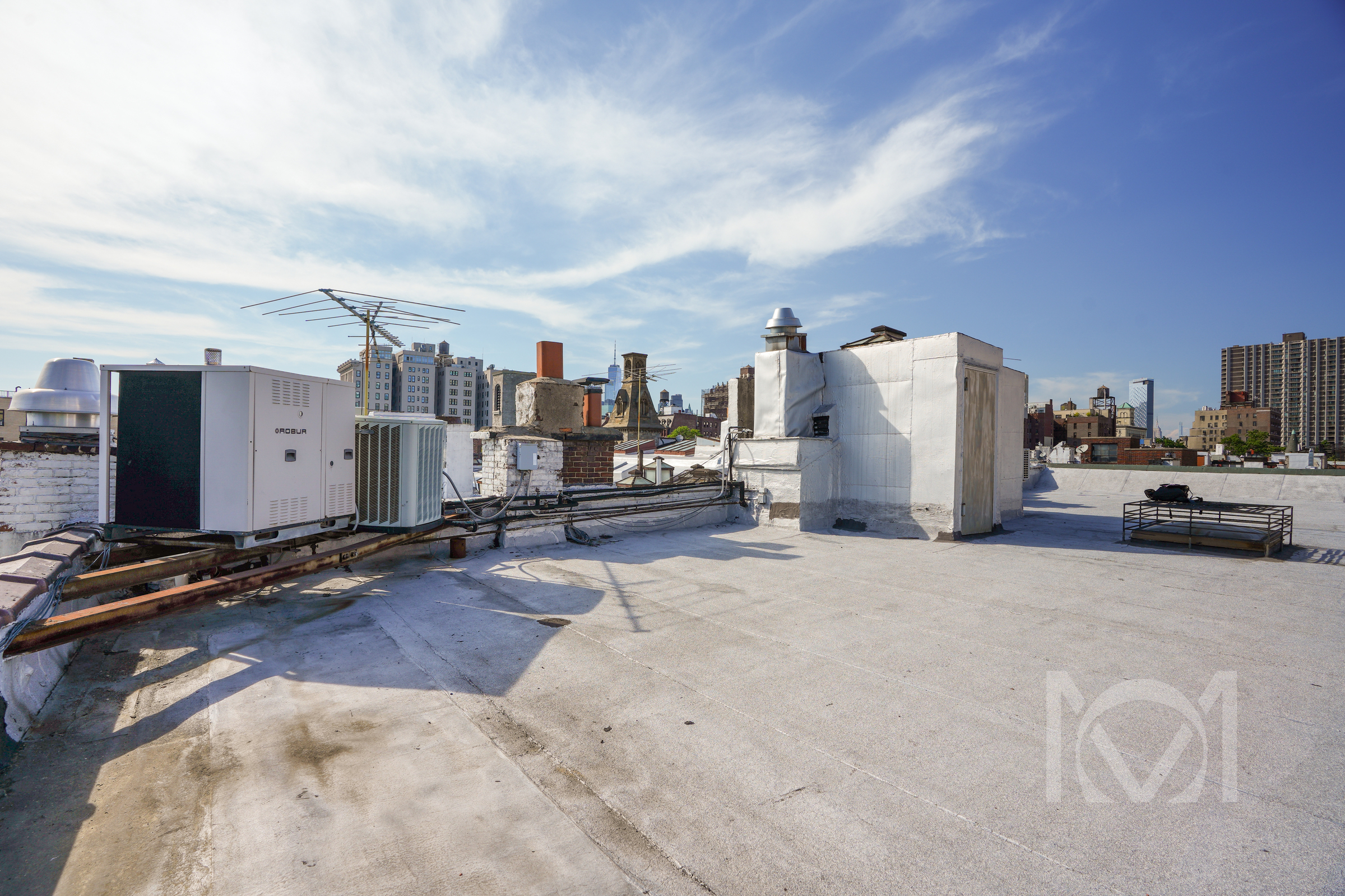 132 Remsen Street, Unit 12 Brooklyn, NY 11201 - Photo 8 of 8 a view of a city street with tall buildings