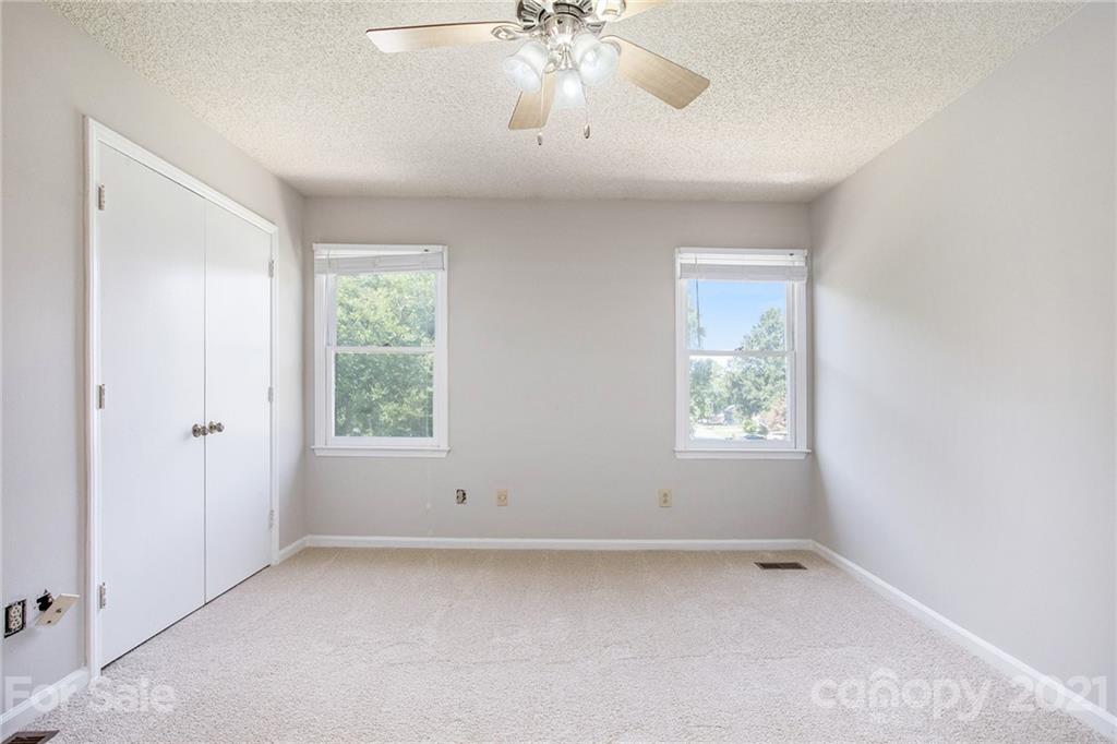 5625 Beaconsfield Road Charlotte, NC 28214 - Photo 11 of 21 a view of an empty room with a window