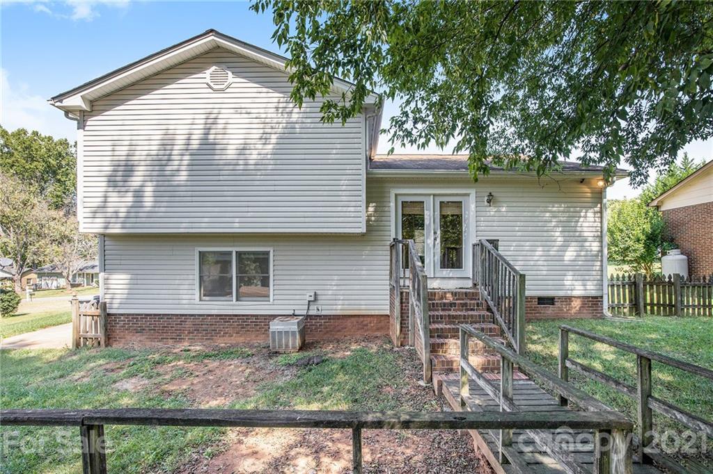 5625 Beaconsfield Road Charlotte, NC 28214 - Photo 13 of 21 front view of a house with a porch