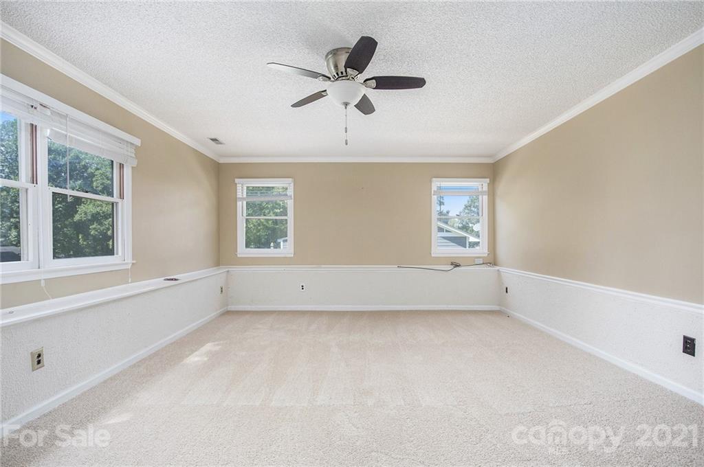 5625 Beaconsfield Road Charlotte, NC 28214 - Photo 15 of 21 a view of an empty room with a window