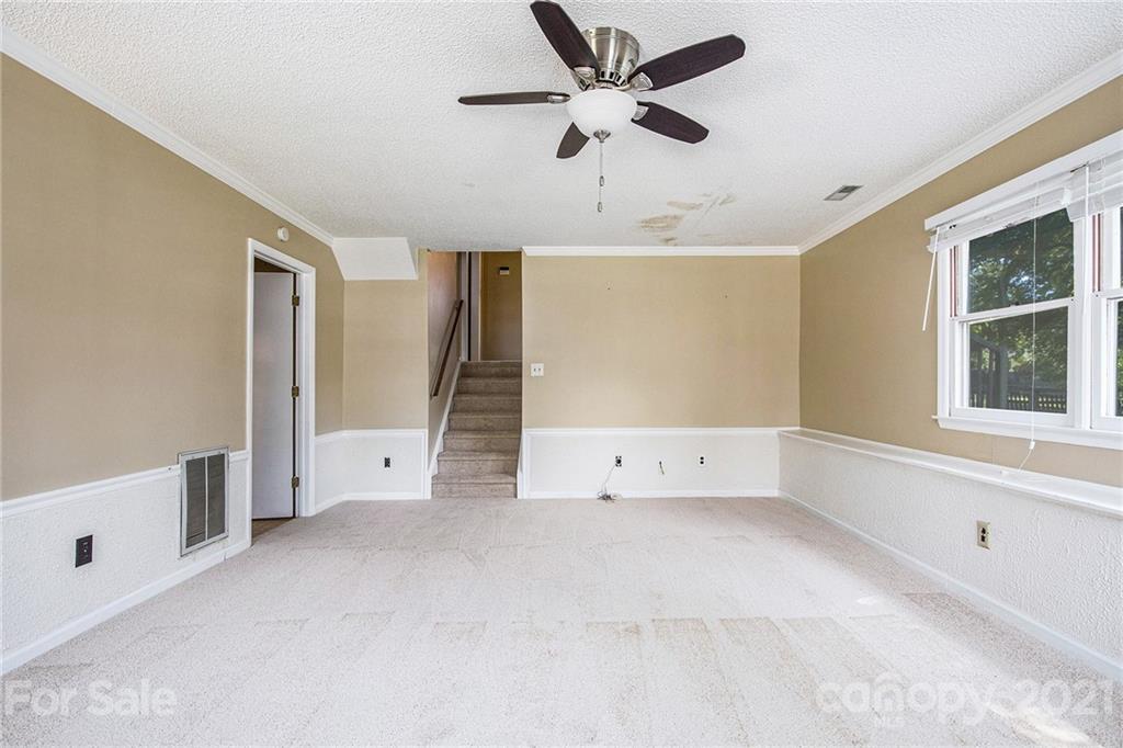 5625 Beaconsfield Road Charlotte, NC 28214 - Photo 16 of 21 a view of an empty room with a window