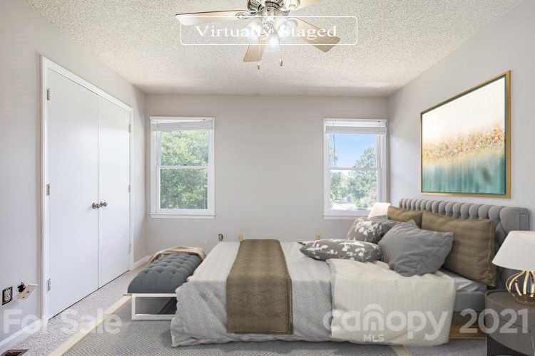 5625 Beaconsfield Road Charlotte, NC 28214 - Photo 3 of 21 a bedroom with a bed and window