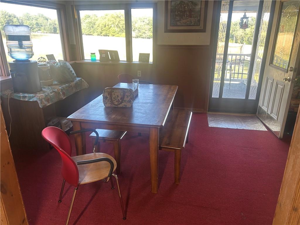 65 Sandrock Road Vanderbilt, PA 15486 - Photo 8 of 30 a view of a dining room with furniture and wooden floor