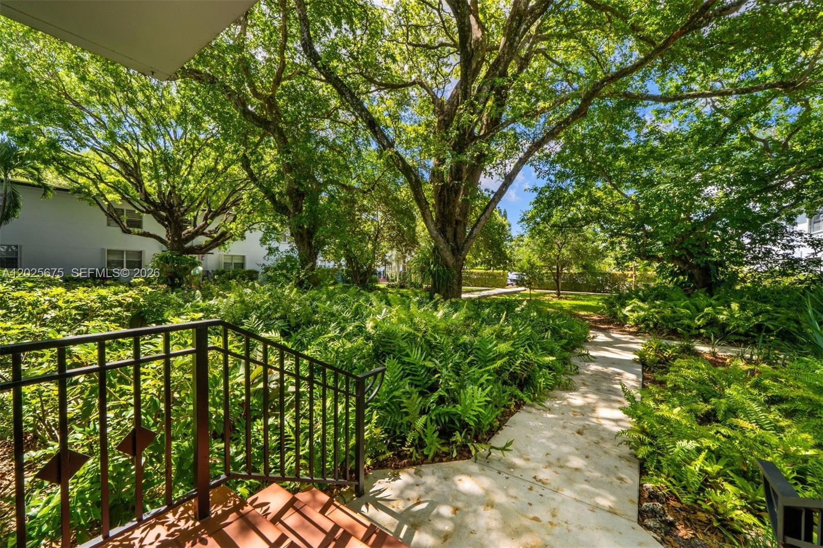 5605 Southwest 80th Street, Unit 10D Miami, FL 33143 - Photo 3 of 43 Lush tropical grounds