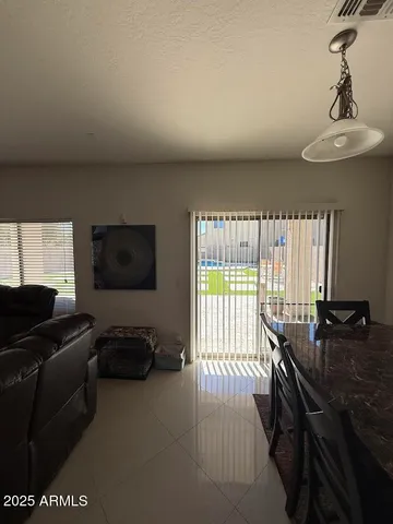 a view of a swimming pool with a yard