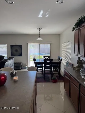 a view of a dining room with furniture