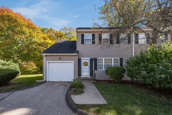 front view of house with a yard