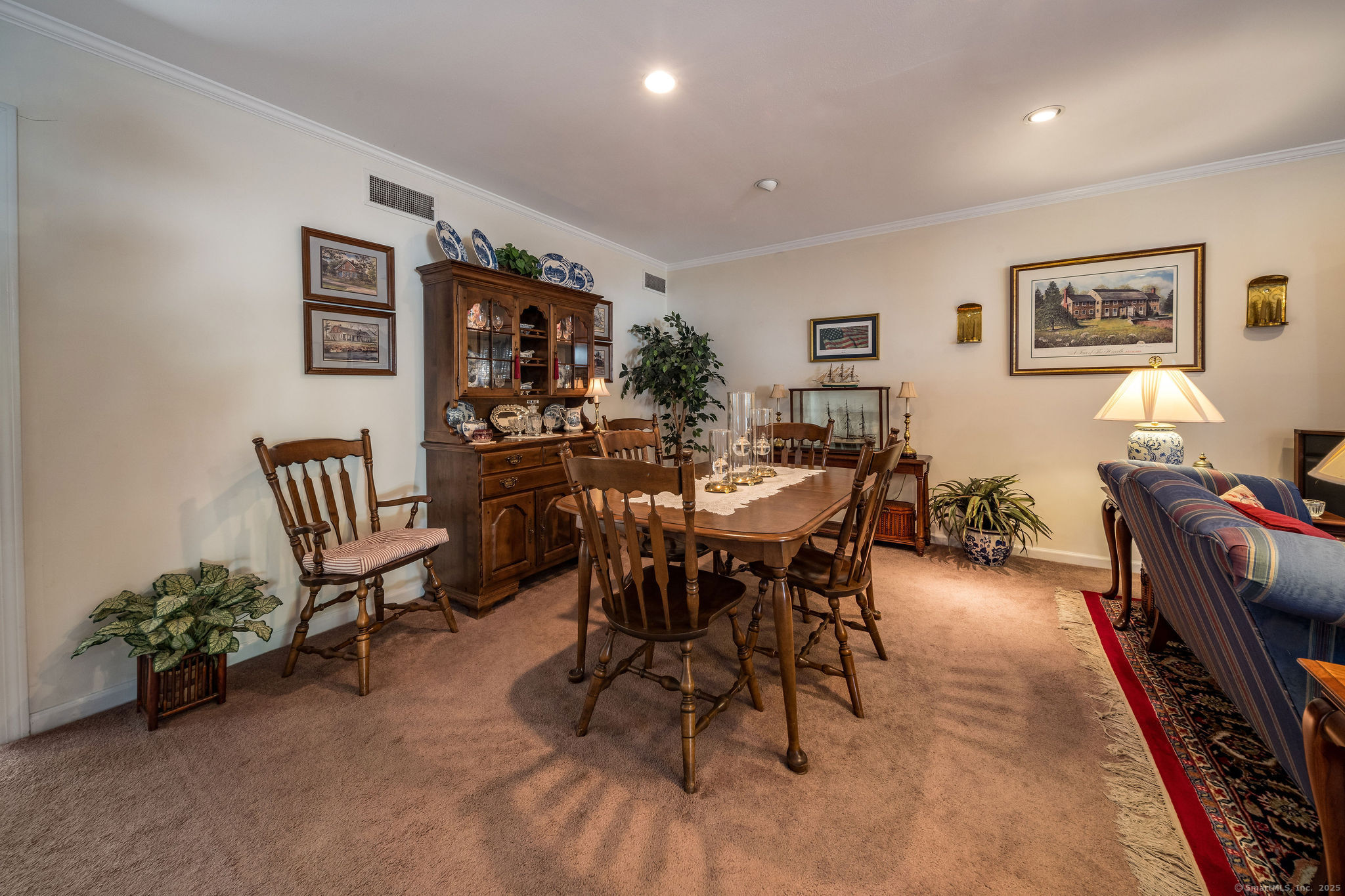 45 Wilshire Road, Unit 45 Madison, CT 06443 - Photo 5 of 25 a view of a dining room with furniture
