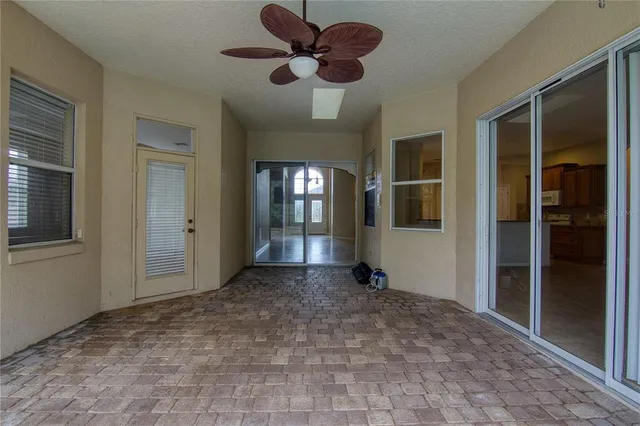 a view of an empty room with a bathroom
