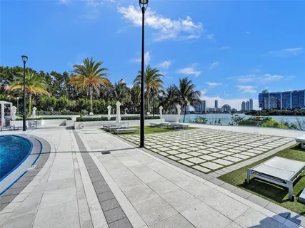 a view of swimming pool with a yard
