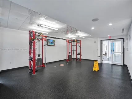 a view of a room with gym equipment