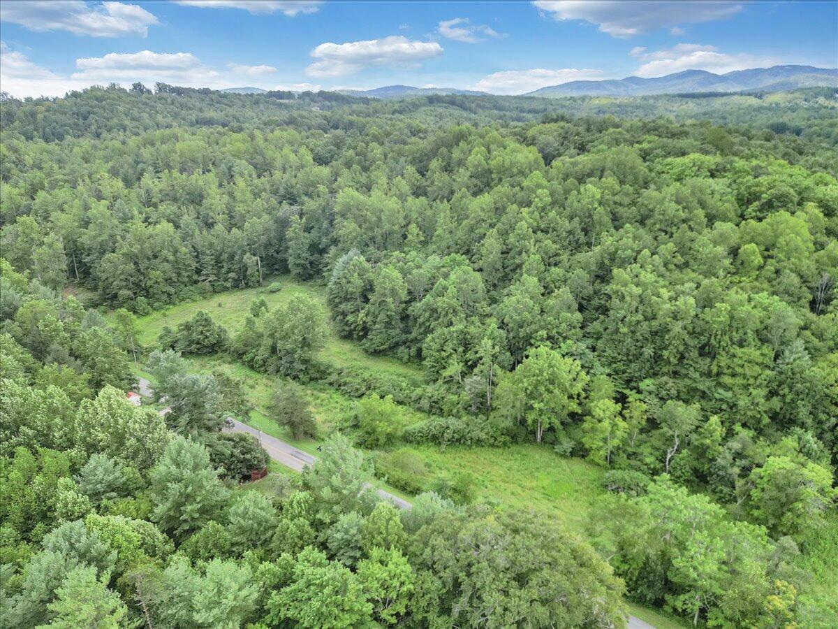 3 Ferrum Mountain Road Callaway, VA 24067 - Photo 1 of 13 a view of a green field in the middle of a field