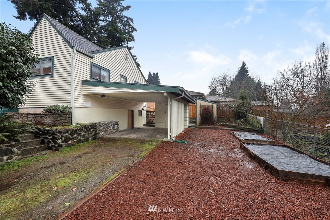 617 Reiten Road Kent, WA 98030 - Photo 18 of 30 a view of a house with a yard and large tree