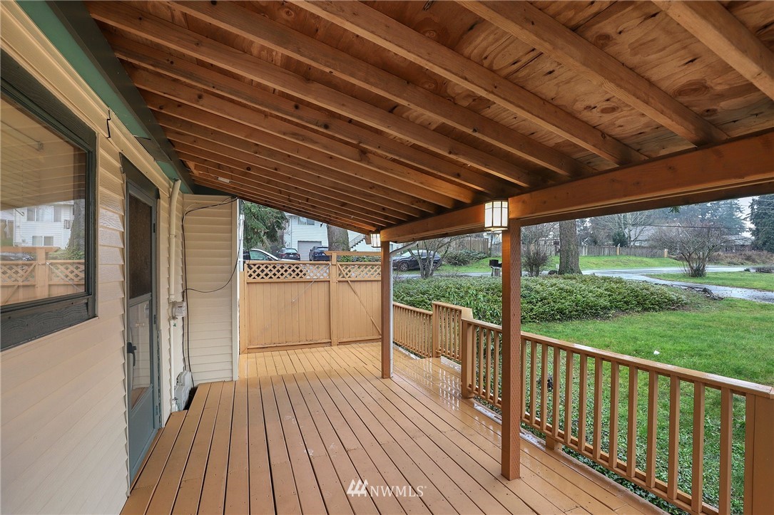 617 Reiten Road Kent, WA 98030 - Photo 20 of 30 a view of a balcony with wooden floor