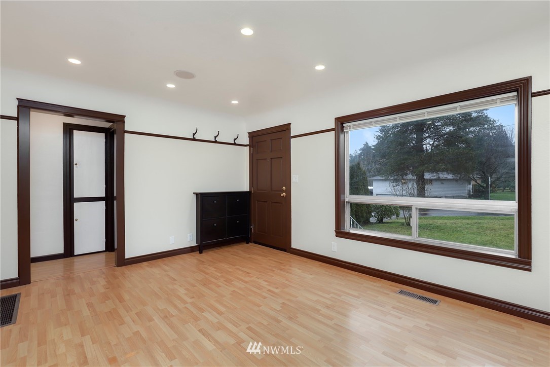 617 Reiten Road Kent, WA 98030 - Photo 3 of 30 a view of an empty room with a window
