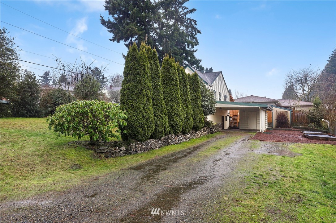 617 Reiten Road Kent, WA 98030 - Photo 25 of 30 a view of a house with a yard