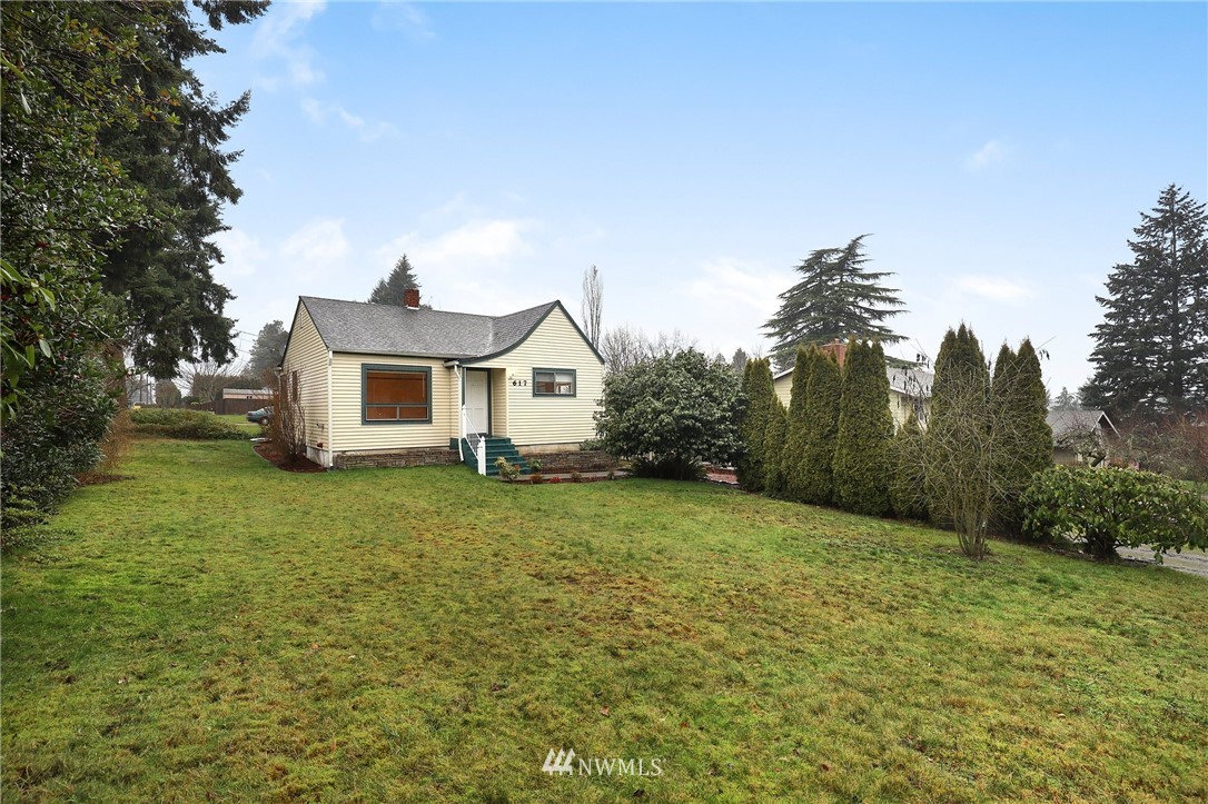 617 Reiten Road Kent, WA 98030 - Photo 26 of 30 a front view of a house with a yard