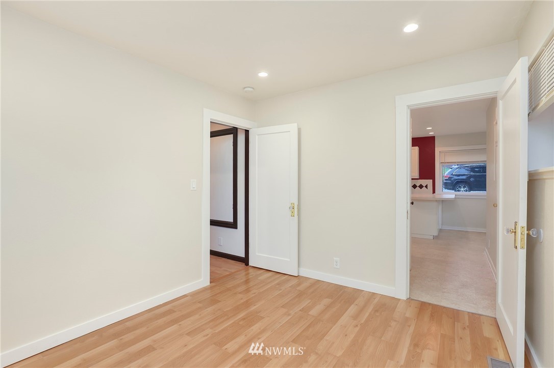 617 Reiten Road Kent, WA 98030 - Photo 10 of 30 a view of hallway with wooden floor