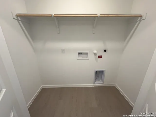 an empty room with an outdoor seating area