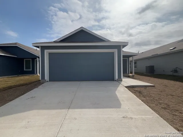 a picture of a room with a bench and a wooden floor