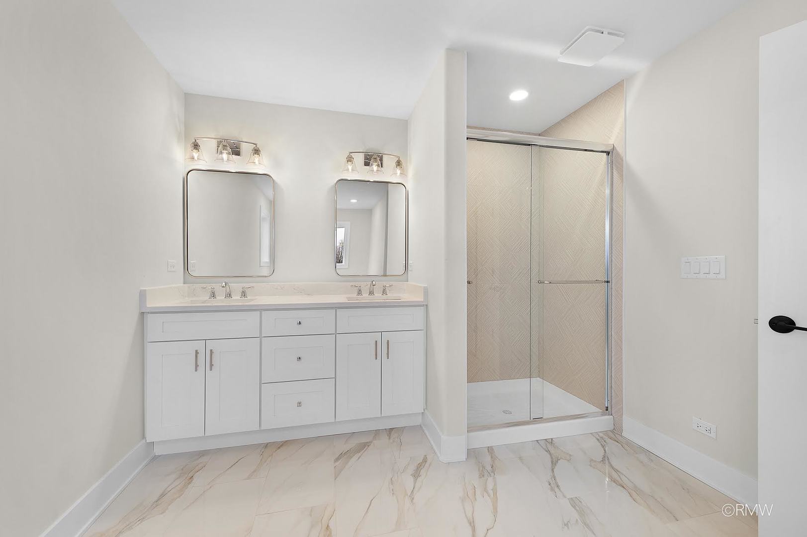 25-w275 Doris Avenue Carol Stream, IL 60188 - Photo 23 of 31 a bathroom with a double vanity sink and mirror