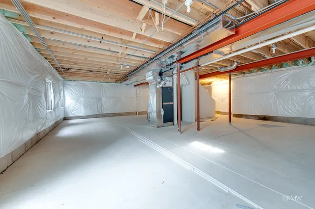 a view of empty room with windows