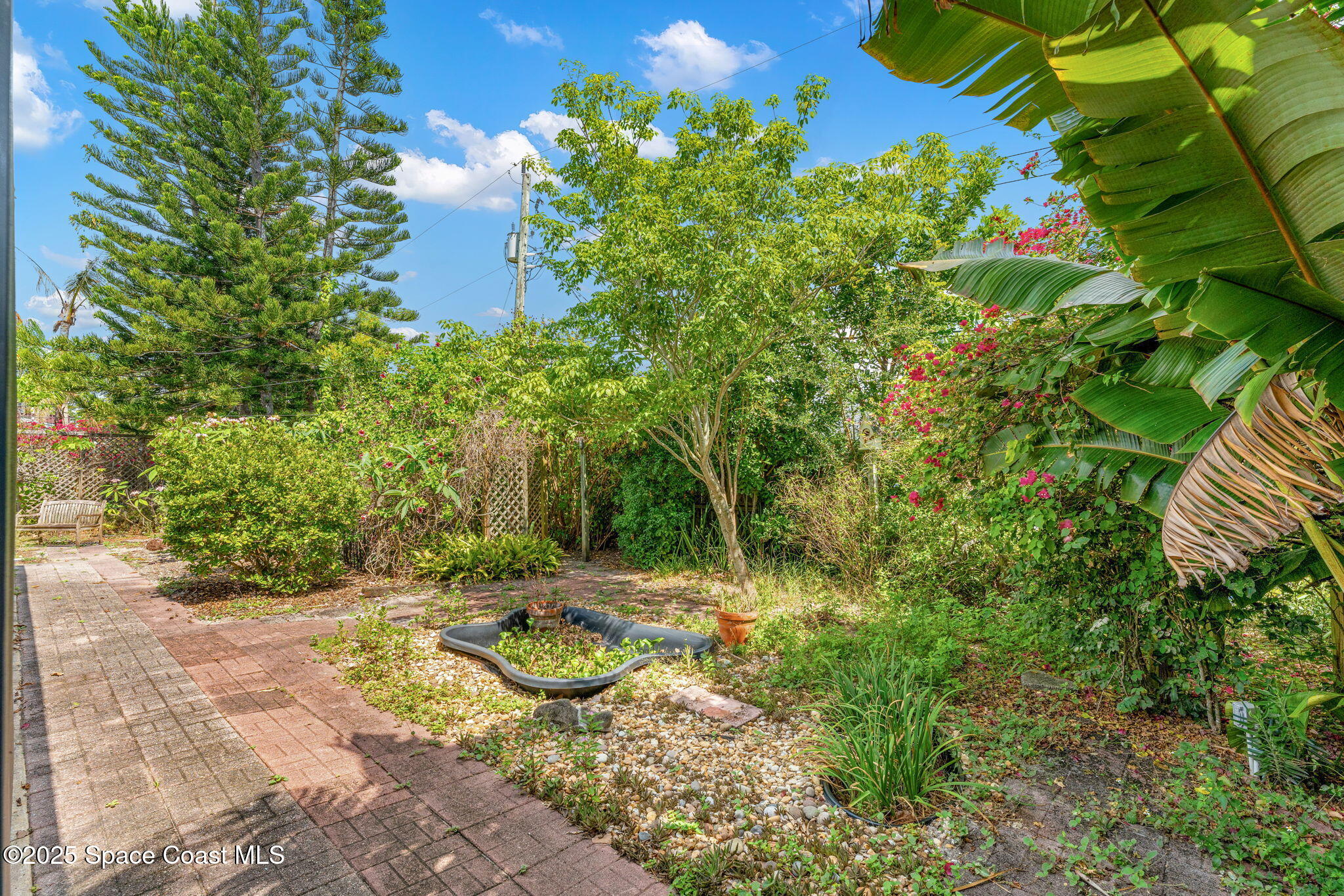 544 Solitaire Palm Drive Indialantic, FL 32903 - Photo 28 of 37 a view of a backyard