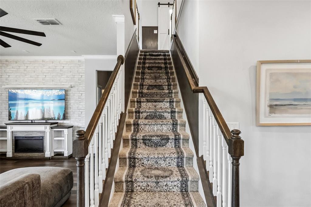 2575 Auburn Ridge Drive Apopka, FL 32712 - Photo 15 of 48 a view of an entryway with wooden floor