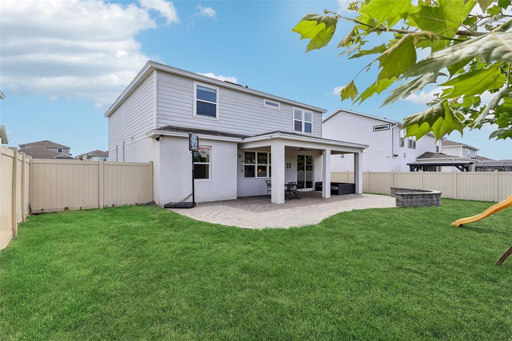 2575 Auburn Ridge Drive Apopka, FL 32712 - Photo 2 of 48 a view of a house with a backyard