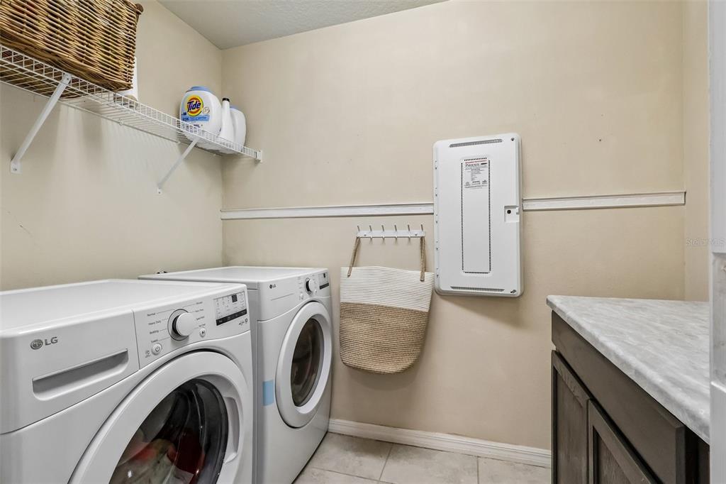 2575 Auburn Ridge Drive Apopka, FL 32712 - Photo 22 of 48 a utility room with dryer and washer