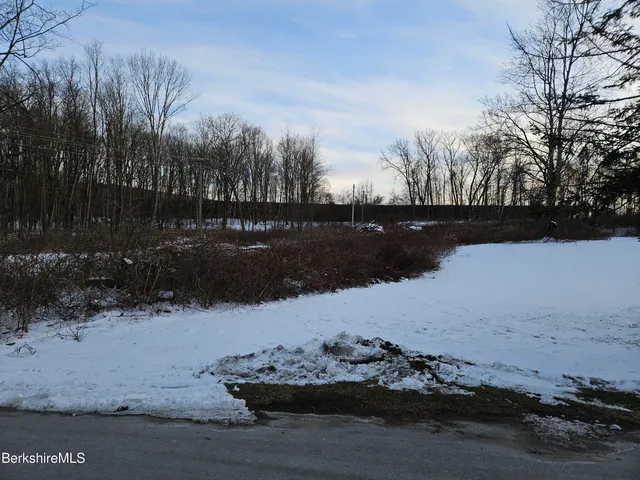 a view of mountain with lake view