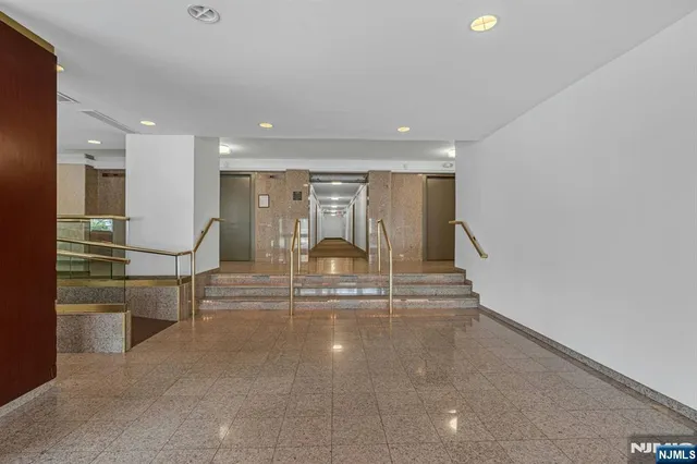 a view of water heater room with stairs
