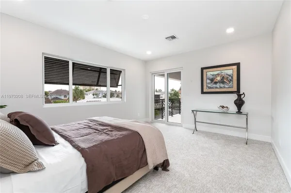a view of swimming pool with chairs