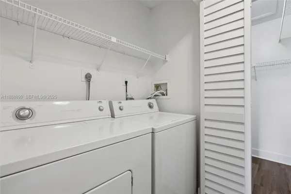 a utility room with dryer and washer