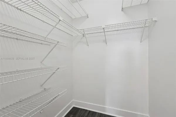 a view of a room with racks on the wall