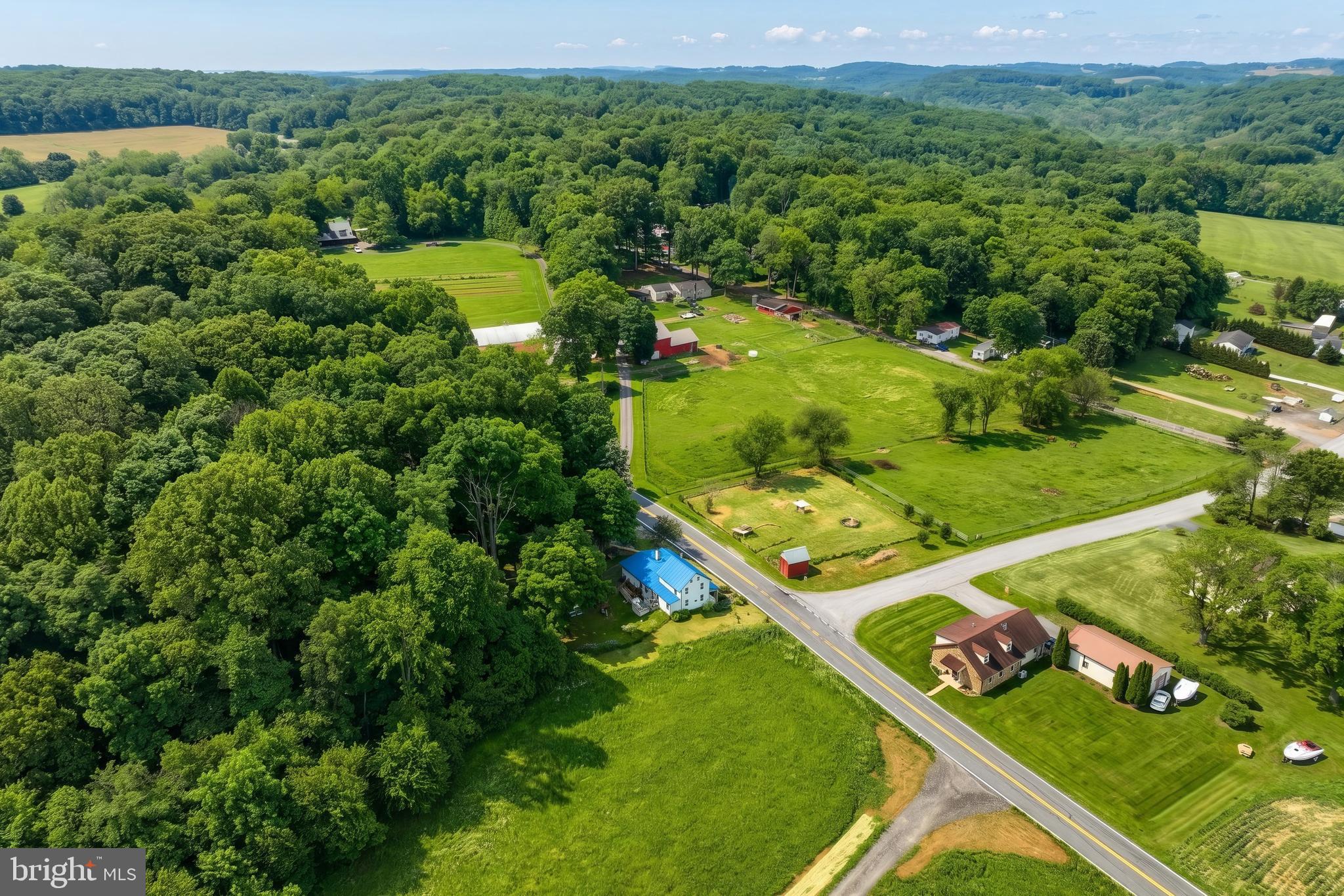 1111 Richmond Road Red Lion, PA 17356 - Photo 55 of 57 an aerial view of a residential houses with outdoor space and trees