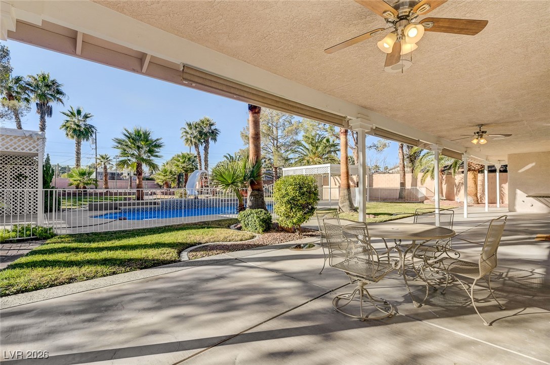 2955 El Camino Road Las Vegas, NV 89146 - Photo 74 of 99 View of patio with a ceiling fan and outdoor dining space