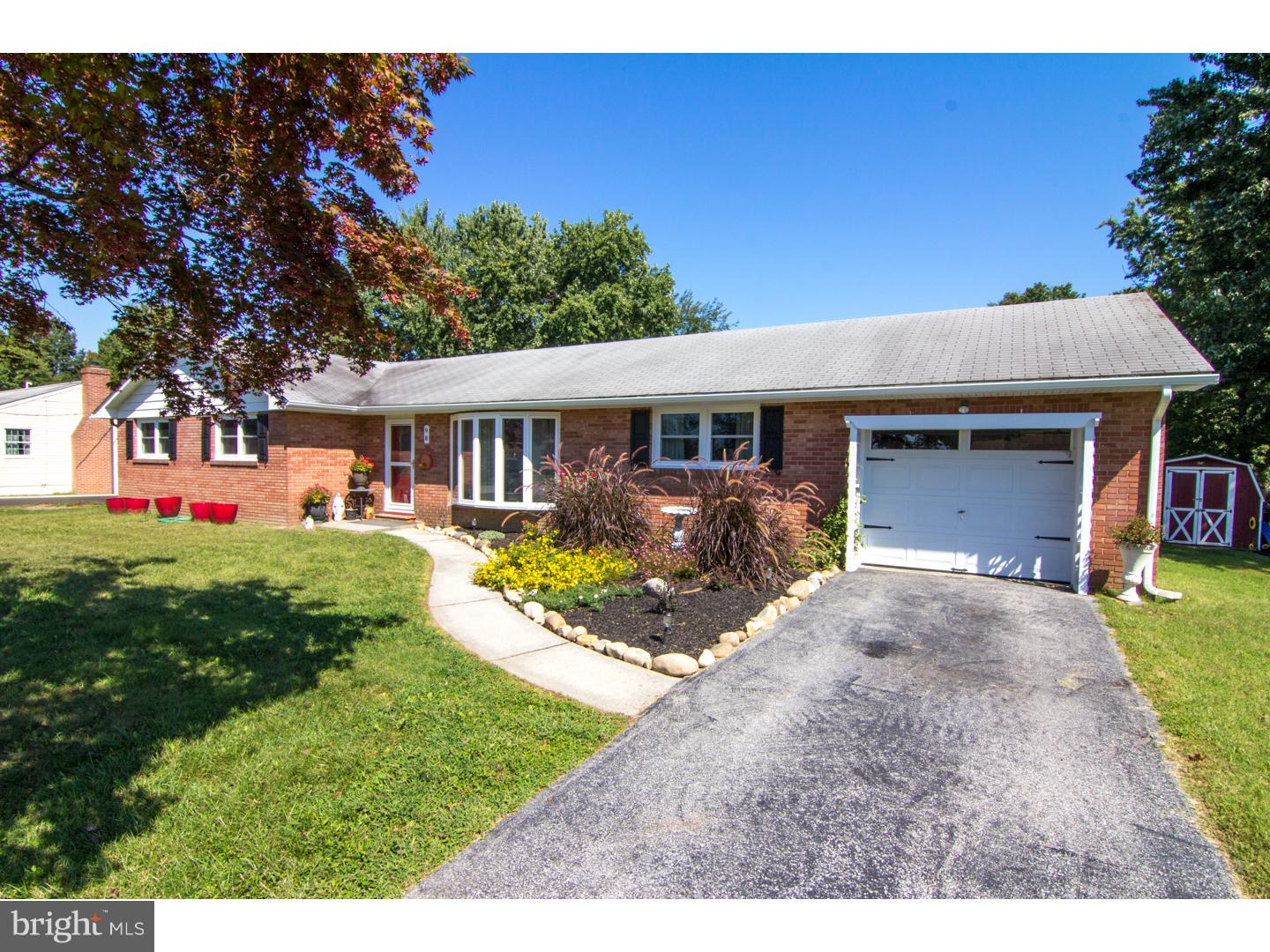 98 Georgia Road Pennsville, NJ 08070 - Photo 1 of 19 a front view of a house with a yard