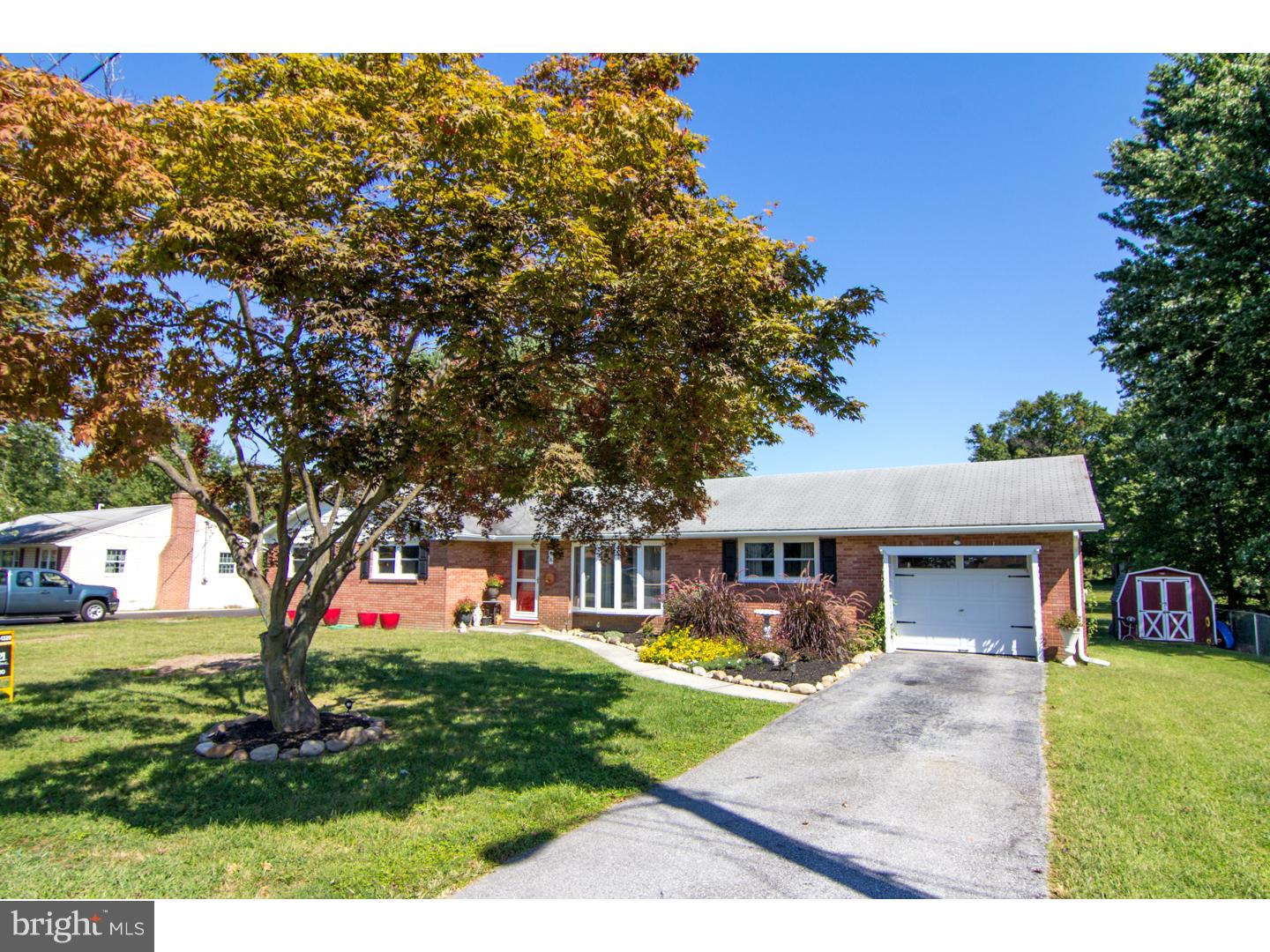 98 Georgia Road Pennsville, NJ 08070 - Photo 2 of 19 a front view of a house with garden