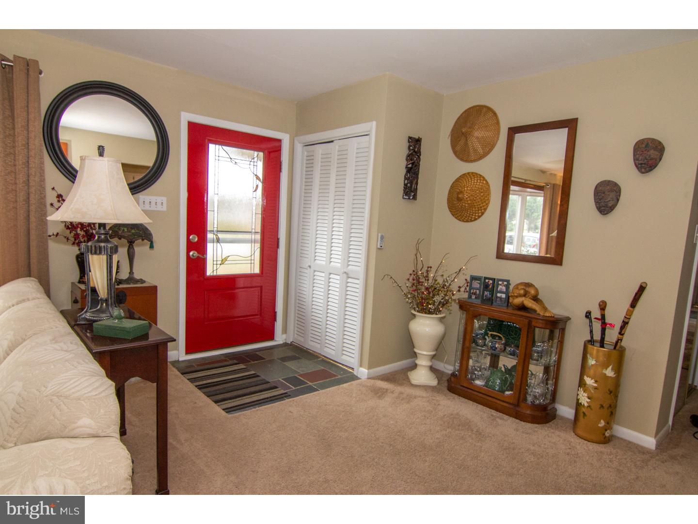 98 Georgia Road Pennsville, NJ 08070 - Photo 12 of 19 a living room with furniture and a window