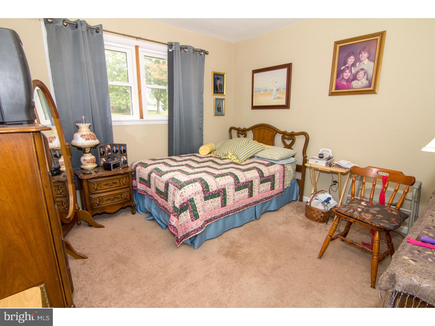 98 Georgia Road Pennsville, NJ 08070 - Photo 15 of 19 a bedroom with bed and a window